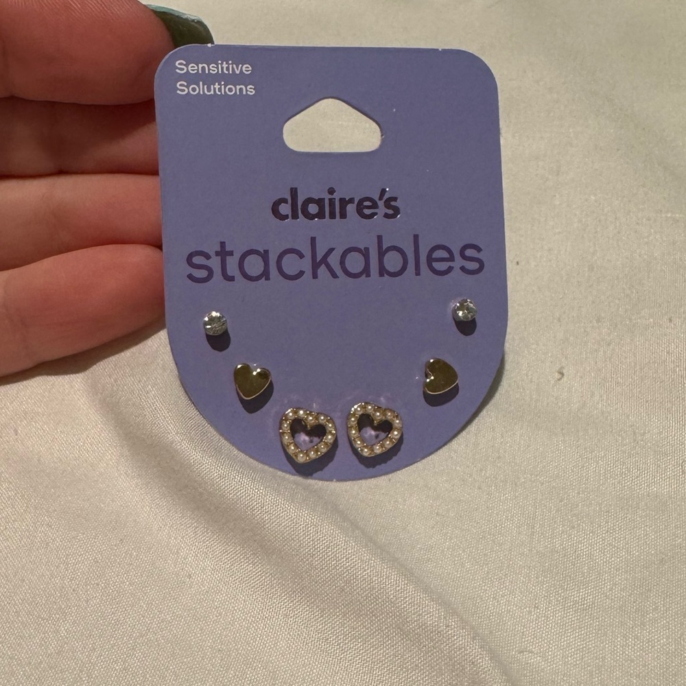 Claire’s stackable heart earrings